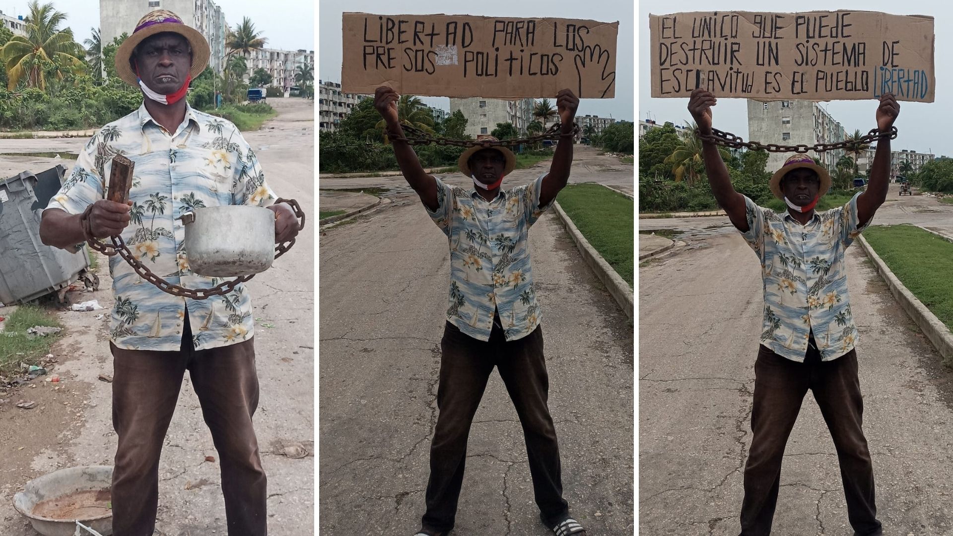 Uno de los carteles rezaba "El único que puede destruir un sistema de esclavitud es el pueblo. ¡Libertad!"; y el otro: "Libertad para los presos políticos"